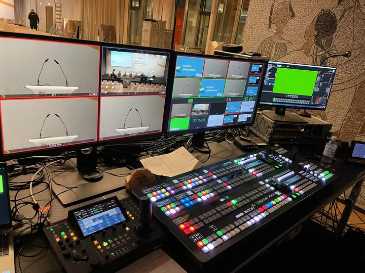 Control room with monitor wall, vision mixer and remote camera control